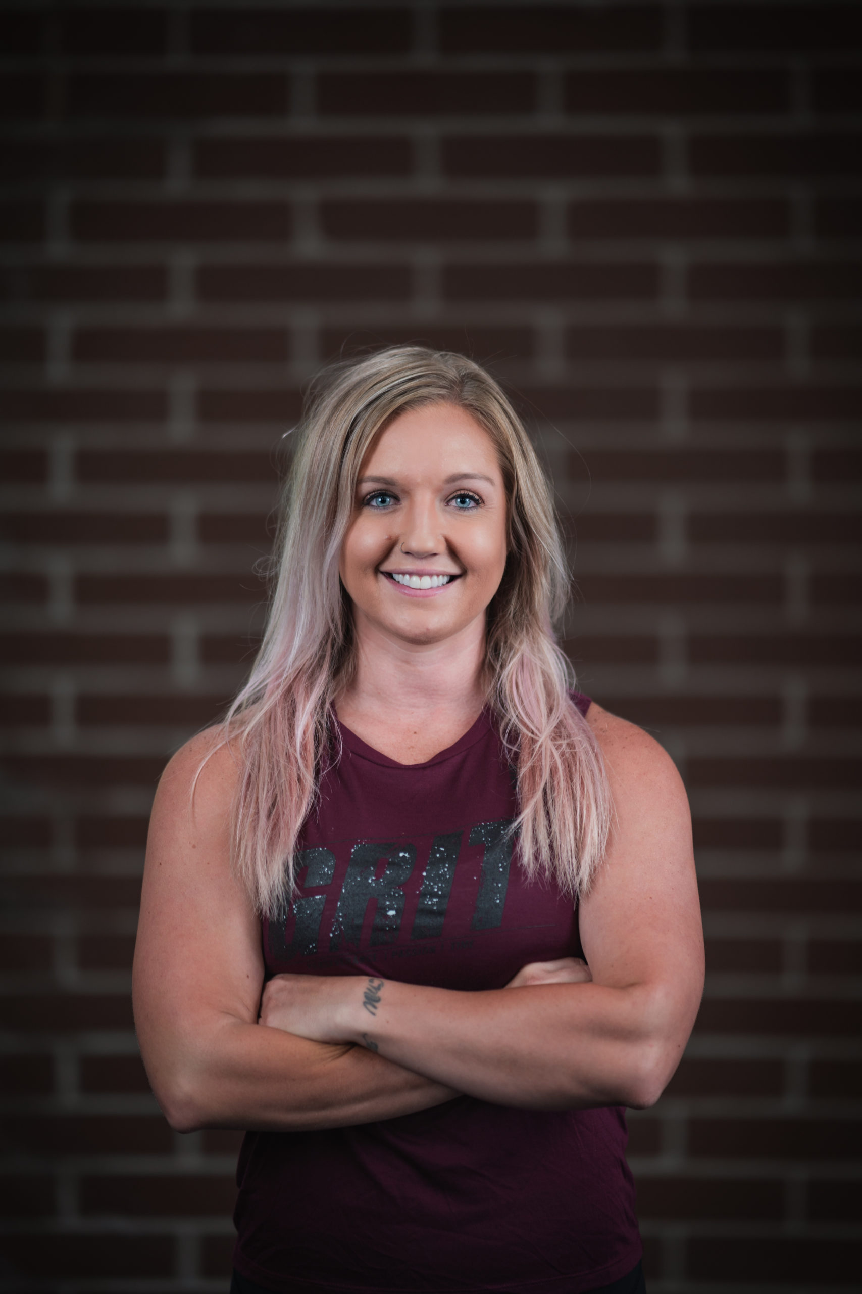 portrait of woman who is an at home coach for strength training and physique